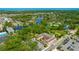 Overhead view of waterfront views with a building featuring a courtyard and access to local parks at 4025 Stratfield Dr, New Port Richey, FL 34652