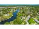 Scenic aerial view of the community and a beautiful waterway at 4025 Stratfield Dr, New Port Richey, FL 34652