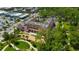 Aerial view of the historic building with beautiful landscaping around the park at 4025 Stratfield Dr, New Port Richey, FL 34652