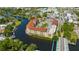 Overhead view of a multi-story waterfront condo featuring beautiful river views, boat docks and garage at 4025 Stratfield Dr, New Port Richey, FL 34652