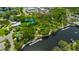Panoramic aerial view of a waterfront park featuring covered picnic spots and waterfront access at 4025 Stratfield Dr, New Port Richey, FL 34652