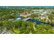 Aerial view displaying community access to water and local buildings at 4025 Stratfield Dr, New Port Richey, FL 34652
