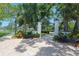 Sims Park entrance featuring manicured grounds, benches, and a brick pathway at 4025 Stratfield Dr, New Port Richey, FL 34652