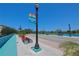 View of the street with benches and banner for New Port Richey in sunny Florida at 4025 Stratfield Dr, New Port Richey, FL 34652