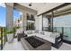 Balcony with an outdoor seating area and fire pit at 4333 Harborpointe Dr, Port Richey, FL 34668
