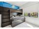 Bedroom featuring a custom built-in bunk bed and bright natural light at 4333 Harborpointe Dr, Port Richey, FL 34668