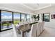Dining room with seating for 10 with views of the ocean at 4333 Harborpointe Dr, Port Richey, FL 34668