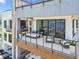 Exterior view of a multi-story home with balconies and ocean views, and a pool at 4333 Harborpointe Dr, Port Richey, FL 34668