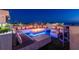 Cozy rooftop lounge with a fire pit and comfortable seating illuminated with blue LED lights at 4333 Harborpointe Dr, Port Richey, FL 34668