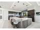 Modern kitchen featuring a large island with seating and stainless steel appliances at 4333 Harborpointe Dr, Port Richey, FL 34668