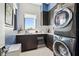 A practical laundry room with modern appliances and lots of counter space at 4333 Harborpointe Dr, Port Richey, FL 34668