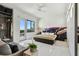 Main bedroom featuring an outdoor balcony and walk-in closet at 4333 Harborpointe Dr, Port Richey, FL 34668