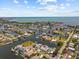 Stunning aerial view of a waterfront property located in a network of canals leading to the ocean at 4387 6Th Isle Dr, Hernando Beach, FL 34607