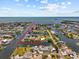 Aerial view showcases the property's prime waterfront location with direct access to the open water and scenic surroundings at 4387 6Th Isle Dr, Hernando Beach, FL 34607
