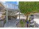 Waterfront home with covered patio, outdoor seating, lush landscaping, and access to the canal at 4387 6Th Isle Dr, Hernando Beach, FL 34607