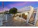 Beautiful backyard featuring an upper deck, patio, and outdoor seating, perfect for entertaining at 4387 6Th Isle Dr, Hernando Beach, FL 34607