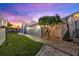 The backyard provides a patio and grass area for many outdoor activities at 4387 6Th Isle Dr, Hernando Beach, FL 34607