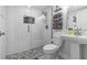 Bathroom with a walk-in shower, stylish tilework, and modern fixtures at 4387 6Th Isle Dr, Hernando Beach, FL 34607