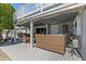 Comfortable waterfront covered patio featuring cozy seating, offering relaxing views of the canal at 4387 6Th Isle Dr, Hernando Beach, FL 34607