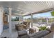 Inviting covered patio with comfy seating, offering a relaxed outdoor atmosphere with a picturesque water view at 4387 6Th Isle Dr, Hernando Beach, FL 34607
