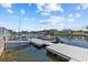 Waterfront dock with a boat lift offers boating and water access at 4387 6Th Isle Dr, Hernando Beach, FL 34607
