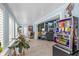 The game room boasts natural light and includes games, access to a living area, and nautical-themed decor at 4387 6Th Isle Dr, Hernando Beach, FL 34607