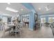 Bright living area with a dining table, a billiards table, and skylights at 4387 6Th Isle Dr, Hernando Beach, FL 34607