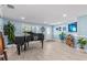 Spacious living room features a grand piano, stylish decor, and plenty of natural light, creating a cozy atmosphere at 4387 6Th Isle Dr, Hernando Beach, FL 34607