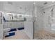 This main bathroom has dual sinks, granite countertop, and beautiful marble surround shower at 4387 6Th Isle Dr, Hernando Beach, FL 34607