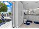 This main bathroom features dual sinks, granite counters, and access to a private outdoor space at 4387 6Th Isle Dr, Hernando Beach, FL 34607