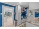 Open-concept mud room featuring storage space, bench, and easy access to the rest of the home at 4387 6Th Isle Dr, Hernando Beach, FL 34607