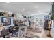 This office space is fully equipped with multiple desks and decorated with sports memorabilia at 4387 6Th Isle Dr, Hernando Beach, FL 34607
