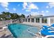 Beautiful pool with a slide and lounge chairs are conveniently connected to the home at 4387 6Th Isle Dr, Hernando Beach, FL 34607