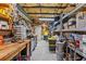 Functional Storage Room featuring multiple workbenches and plenty of space for all of your projects at 4387 6Th Isle Dr, Hernando Beach, FL 34607