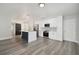 Modern kitchen with white cabinets, stainless steel appliances, and a stylish center island at 4482 Kingston Dr, Hernando Beach, FL 34607