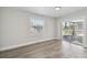 Bright, open living area with sliding glass doors providing a beautiful water view at 4482 Kingston Dr, Hernando Beach, FL 34607