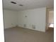 Spacious basement area with neutral carpet, clean walls, and potential for customization and storage at 4529 Keelboat Pl, New Port Richey, FL 34652