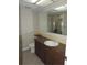 Bathroom vanity with sink, toilet and cabinets at 4529 Keelboat Pl, New Port Richey, FL 34652