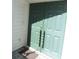 Elegant double front door with decorative handles and a classic knocker detail at 4529 Keelboat Pl, New Port Richey, FL 34652