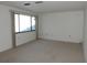 Bright living room with large window allowing natural light at 4529 Keelboat Pl, New Port Richey, FL 34652