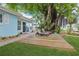 Backyard featuring lounge chairs on a deck with a view of the water at 4942 Blue Heron Dr, New Port Richey, FL 34652