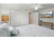 Inviting bedroom with closet, TV, and warm lighting creating a relaxing retreat at 4942 Blue Heron Dr, New Port Richey, FL 34652