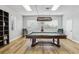 Cozy billiard room featuring a classic billiard table and comfortable seating at 4942 Blue Heron Dr, New Port Richey, FL 34652