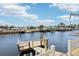 Scenic view of a private dock and canal, perfect for boating and waterfront living at 4942 Blue Heron Dr, New Port Richey, FL 34652