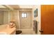 Bathroom with shower and tub combination, large mirror and good lighting at 5309 Bayonne Ave, Spring Hill, FL 34608