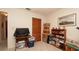 Neutral bedroom featuring carpet floors and a wooden closet with ample storage space at 5309 Bayonne Ave, Spring Hill, FL 34608