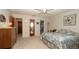 Spacious bedroom with a large dresser and ensuite bathroom, offering comfort and convenience at 5309 Bayonne Ave, Spring Hill, FL 34608