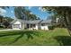 Charming single-story home with well-maintained lawn and landscaped front yard at 5309 Bayonne Ave, Spring Hill, FL 34608