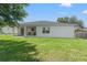 Large, well-maintained backyard with a spacious lawn, ideal for recreation and outdoor activities at 5328 Baldock Ave, Spring Hill, FL 34608