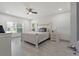 Bright bedroom with a ceiling fan, a large window with natural light, and nice, neutral decor at 5328 Baldock Ave, Spring Hill, FL 34608